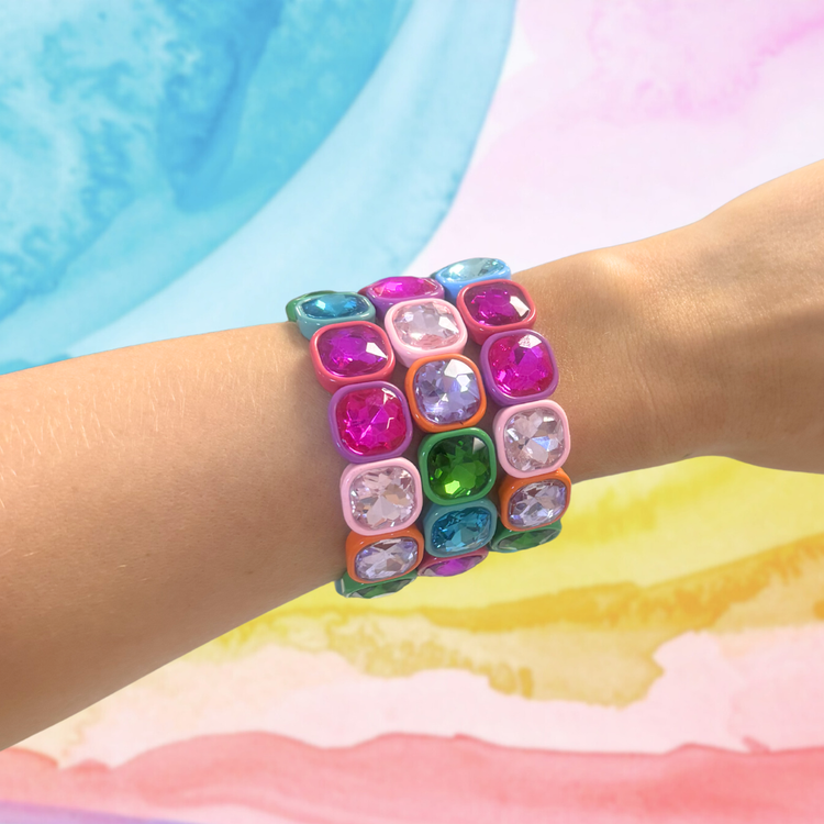 Heel Yeah Boutique Frankie Bracelet featuring multi-colored square crystal beads on a wrist against a pastel background
