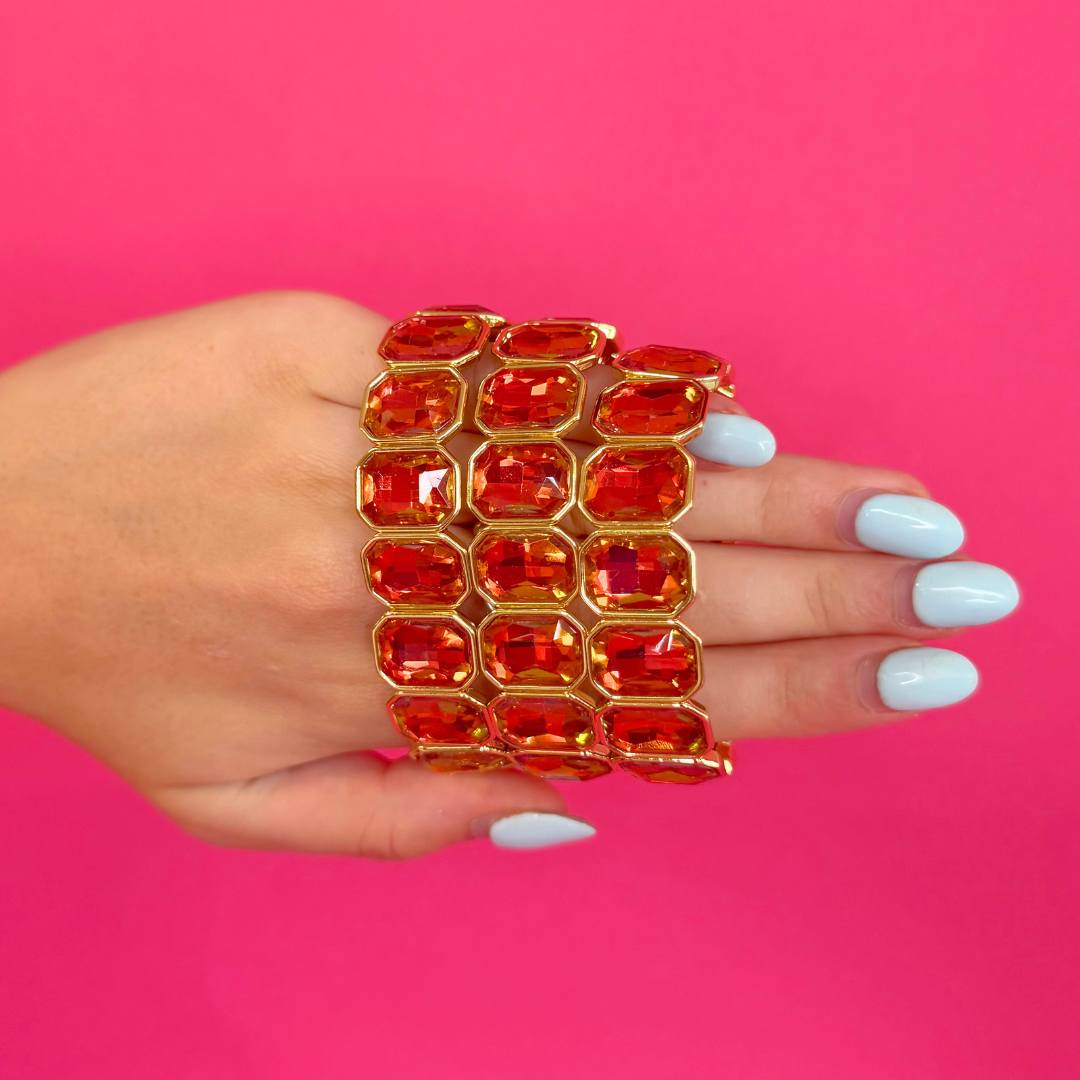 Heel Yeah Boutique Fall Giselle beaded bracelet featuring orange faceted stones in gold settings on a hand