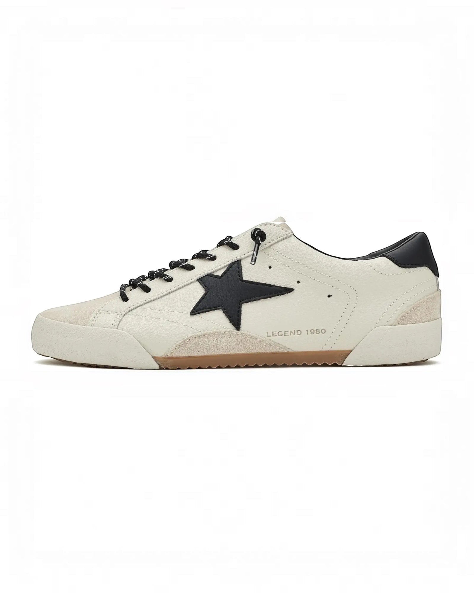 Heel Yeah Boutique Vintage Havana Legend sneakers in white leather and suede with a black star and slip-on design.